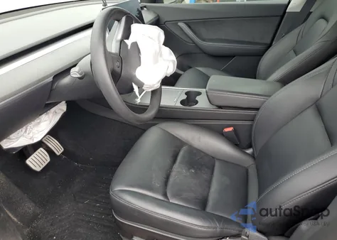 2022 Tesla Model Y from USA, damaged, VIN 7SAYGDEF1NF398639